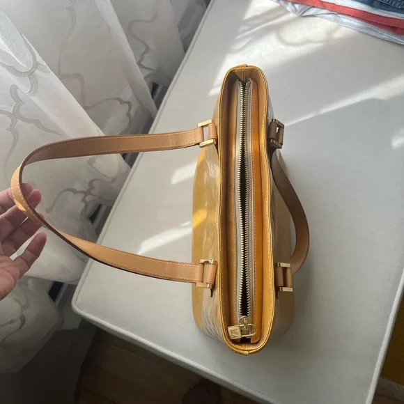 100% Authentic
Louis Vuitton Gold and Tan Houston Vernis - Picture 3 of 14